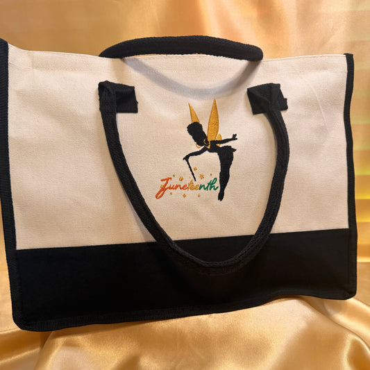 A black and white canvas tote bag with a black handle, featuring a graphic of a martial artist in a black belt stance with a gold sword and the text 'Jiu Jitsu' in orange and green, displayed on a gold satin fabric background.